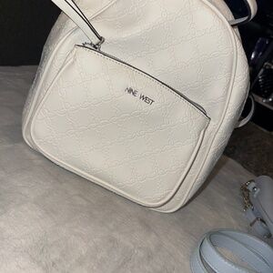 White mini purse backpack